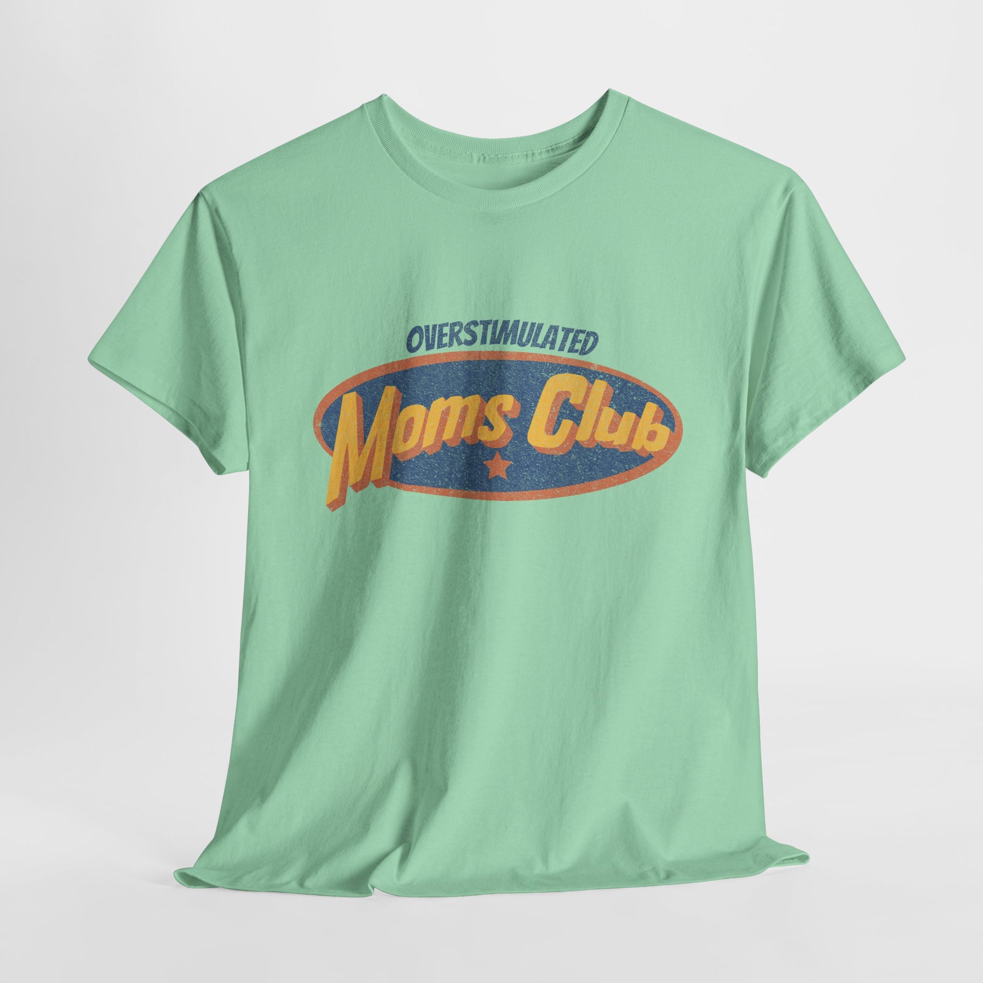 Green t-shirt with 'Overstimulated Moms Club' text on a light gray background