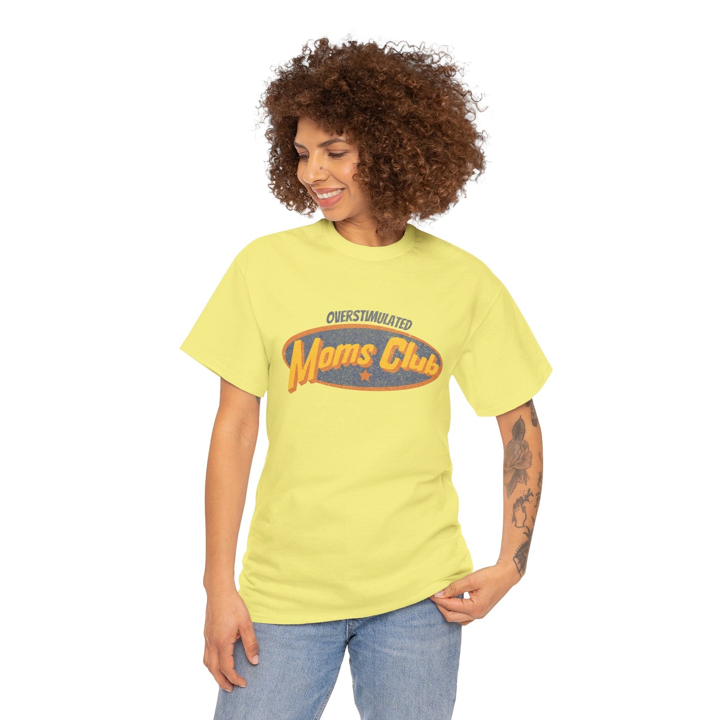 Woman wearing a yellow t-shirt with 'Moms Club' text on a white background