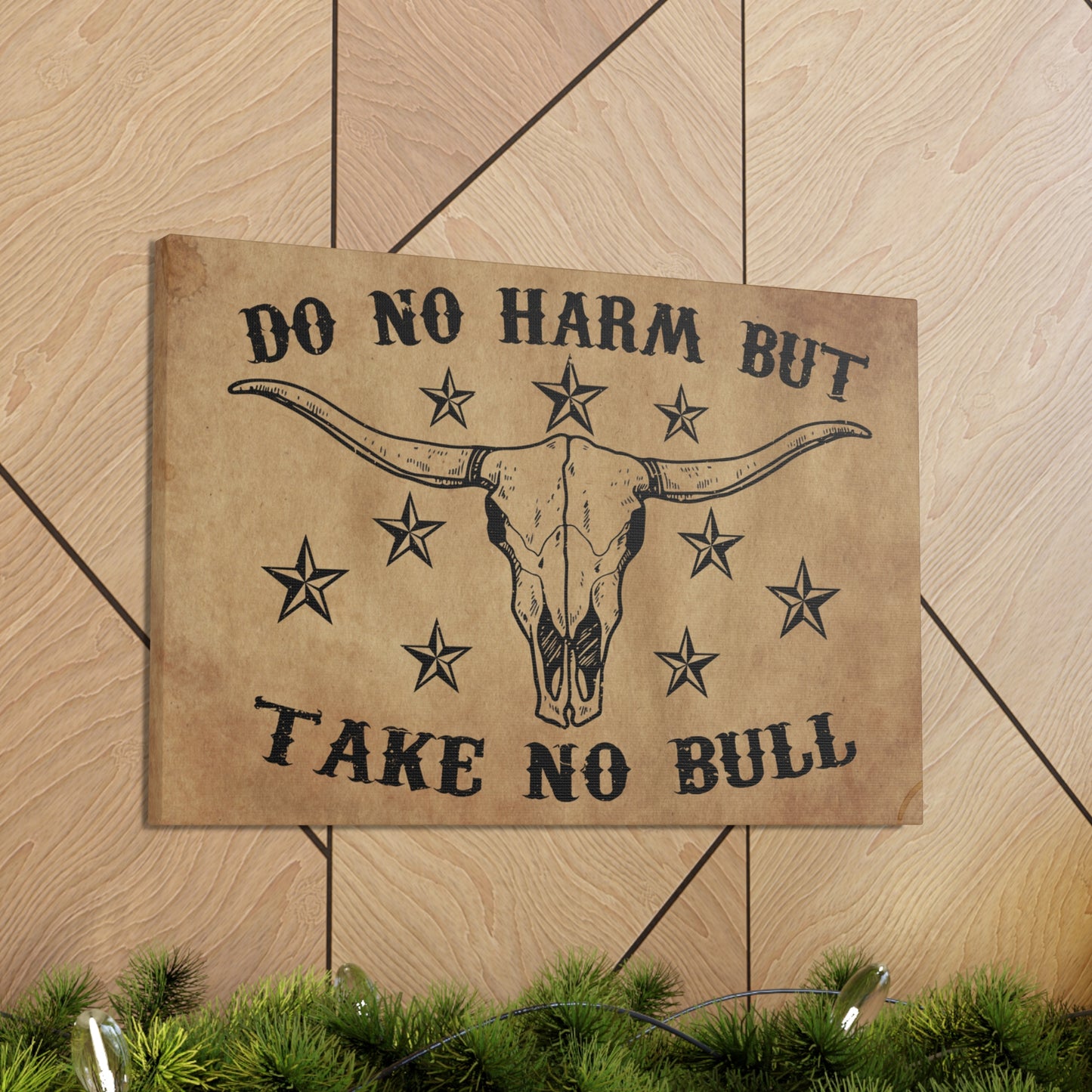 Western-style canvas featuring a longhorn skull and country quote.