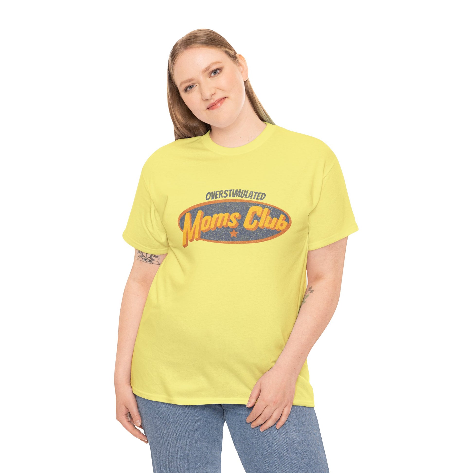 Woman wearing a yellow t-shirt with 'Overstimulated Moms Club' text on a white background