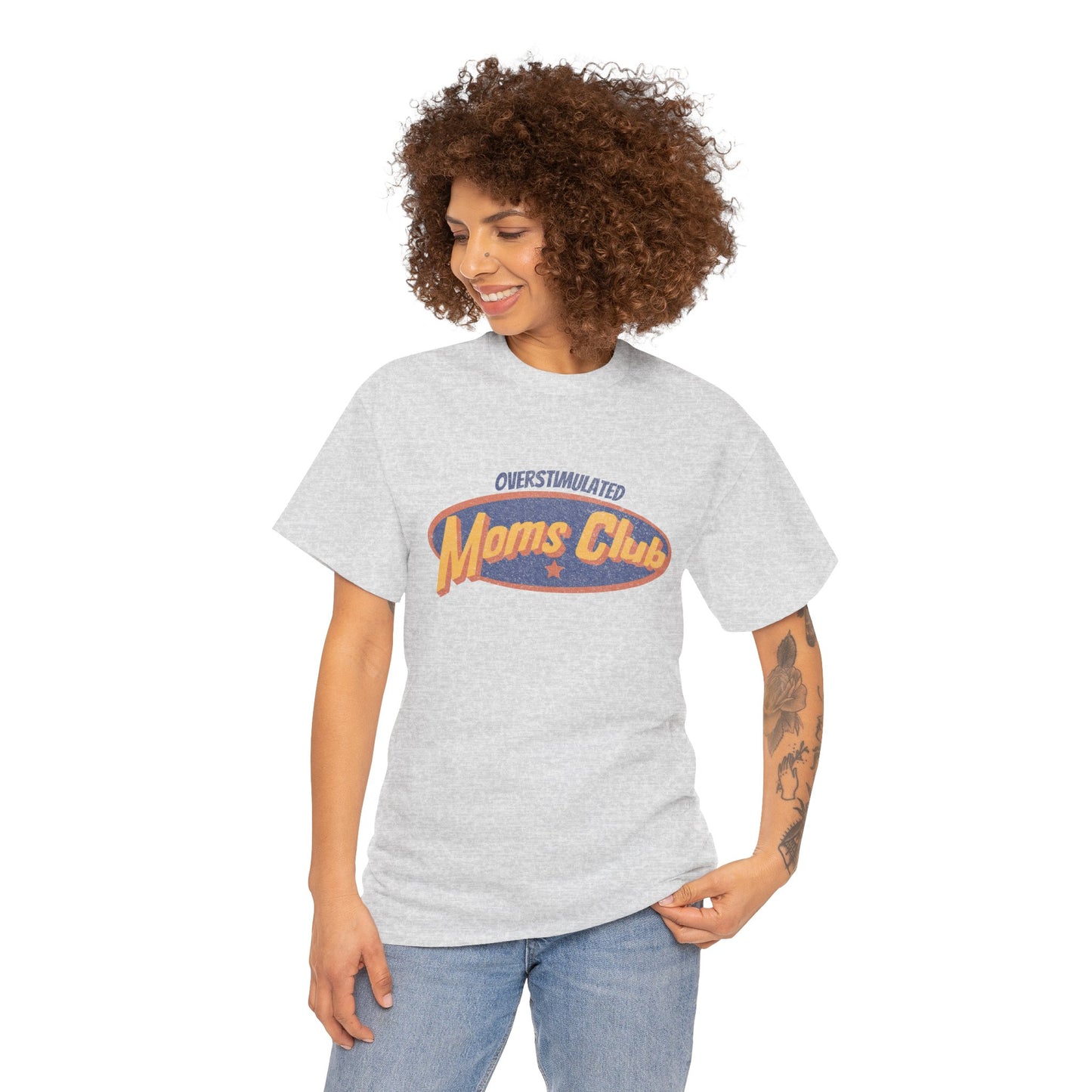 Woman wearing a gray t-shirt with 'Moms Club' text on a white background