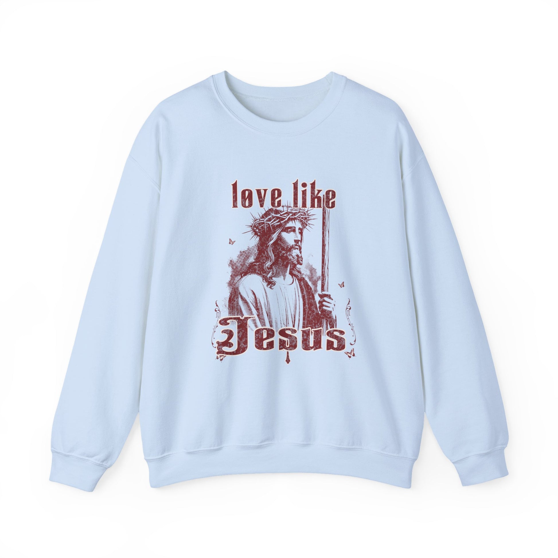 Light blue sweatshirt with a graphic of a religious figure and text on a white background