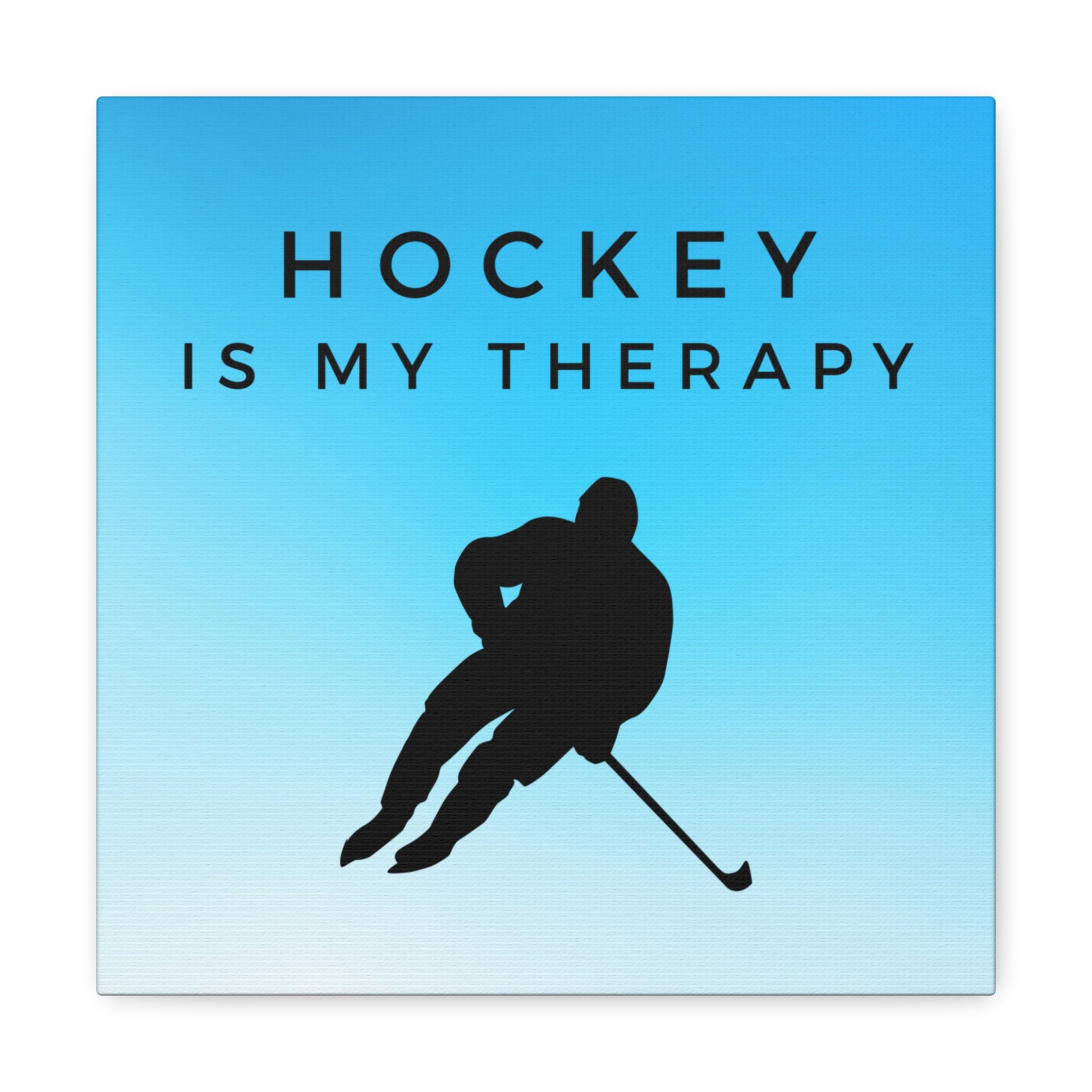 Light blue and white canvas art with bold hockey is my therapy text
