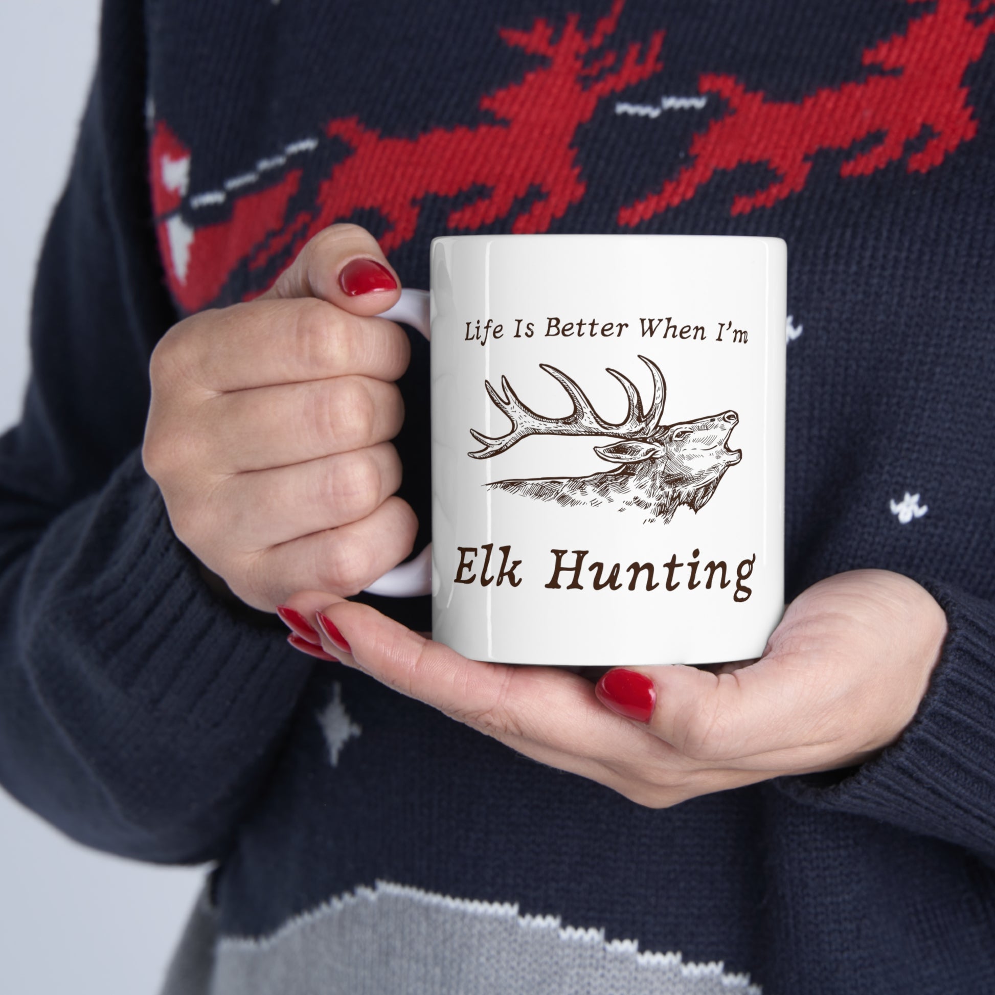 White ceramic mug with "Life Is Better When I’m Elk Hunting" text
