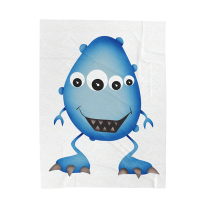 Close-up of the soft and plush fabric of the monster blanket.