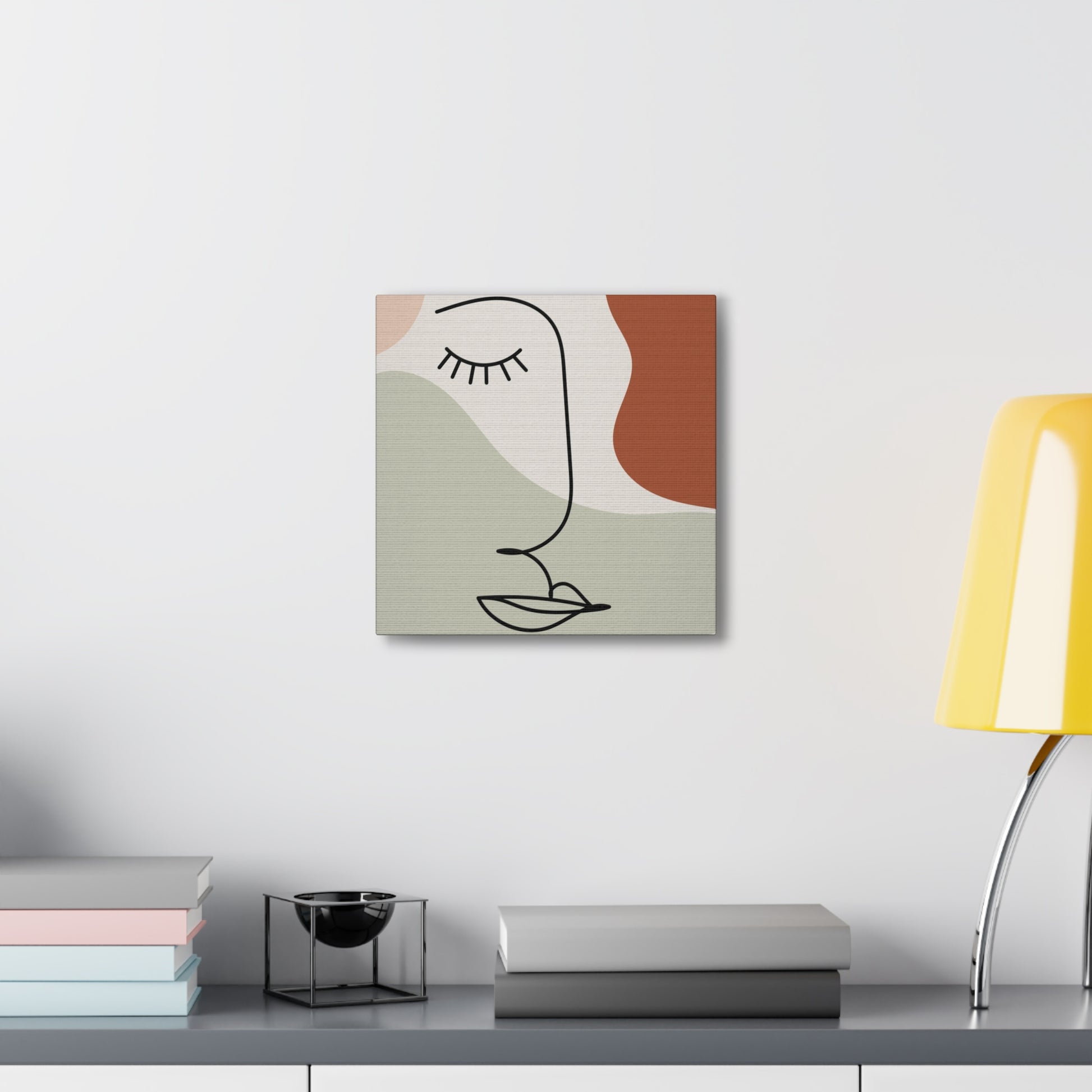 Modern abstract face canvas with line design

