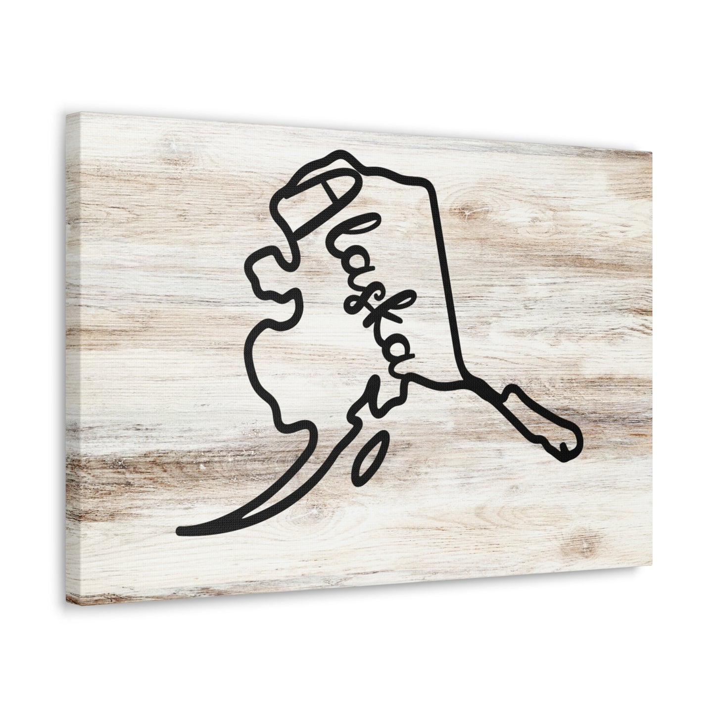 Alaska map wall art on light wood background
