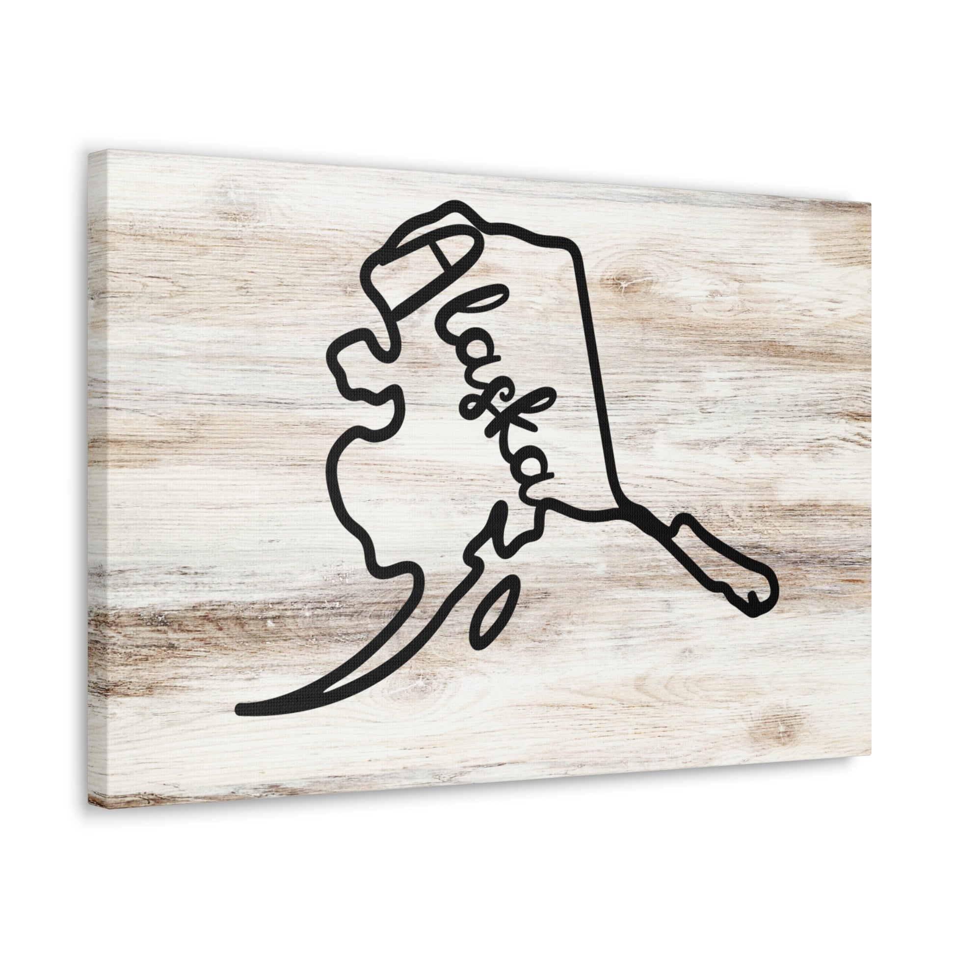 Alaska map wall art on light wood background
