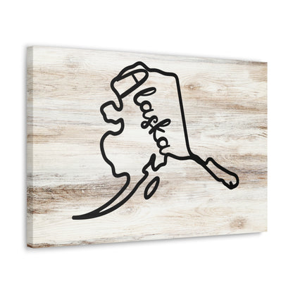 Alaska map wall art on light wood background
