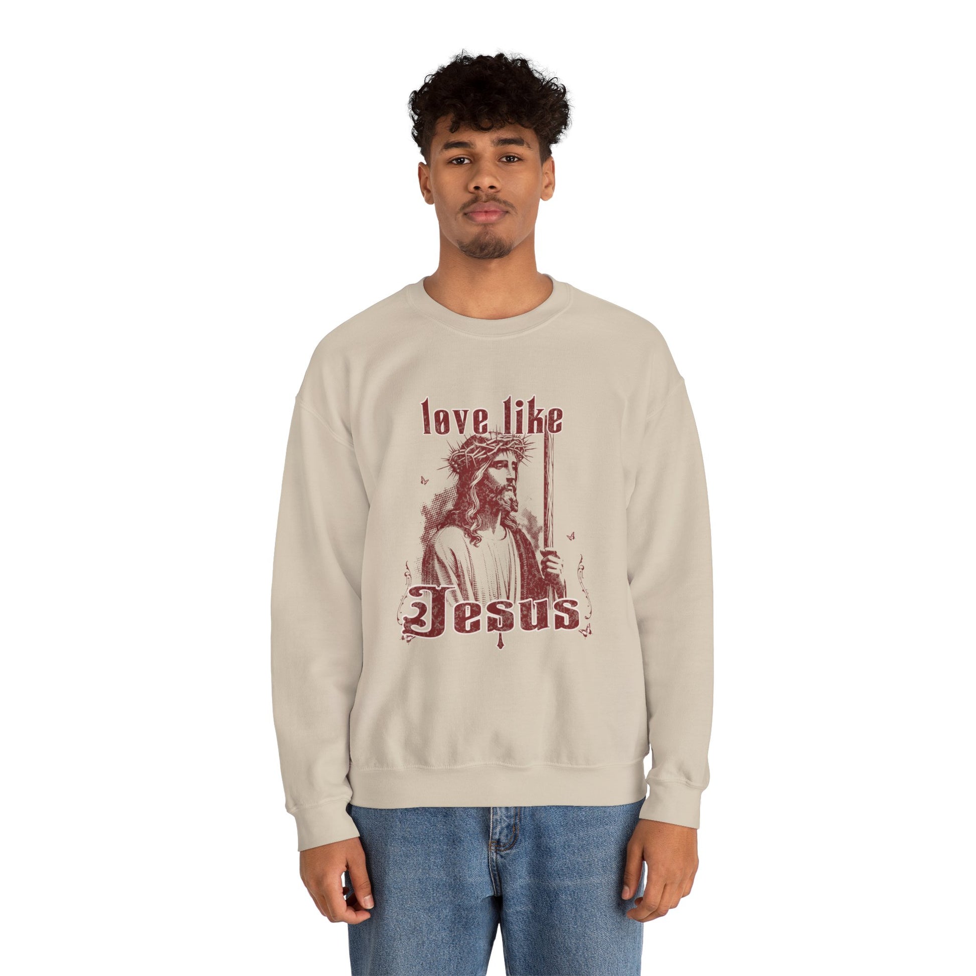 Man wearing a beige sweatshirt with a graphic and text on a white background