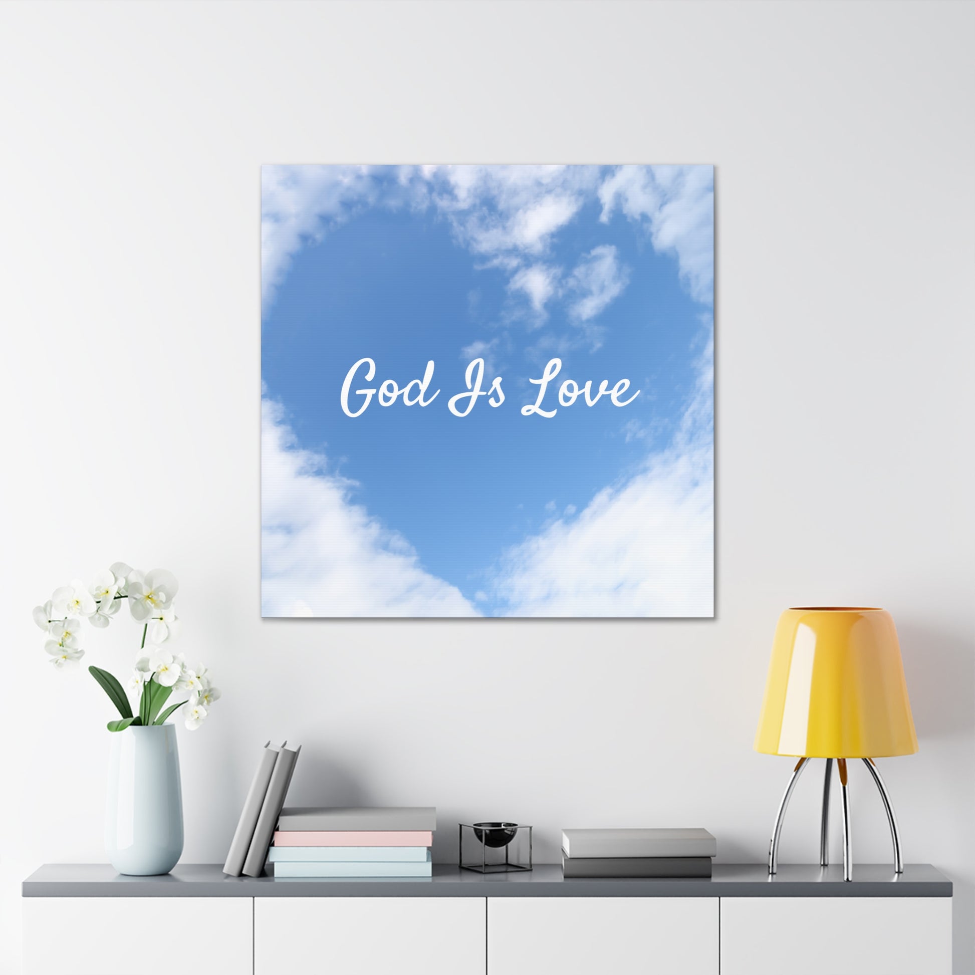 God is Love wall art featuring a heart-shaped sky design
