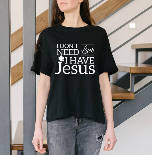 I Don’t Need Luck, I Have Jesus shirt in bold white text.
