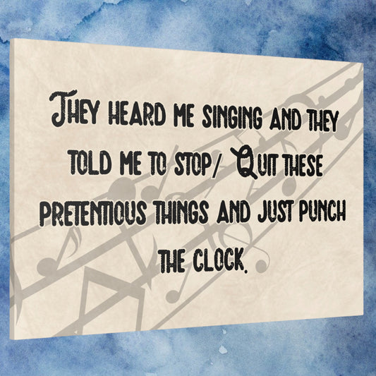 Custom song lyrics canvas with light tan background and musical notes.
