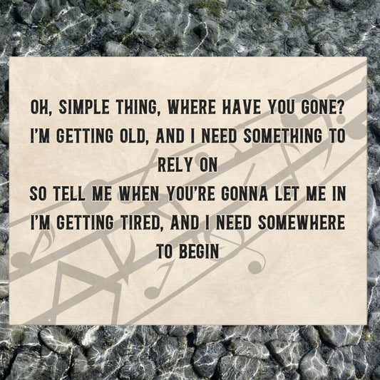 Custom song lyric sign with tan background and music notes.
