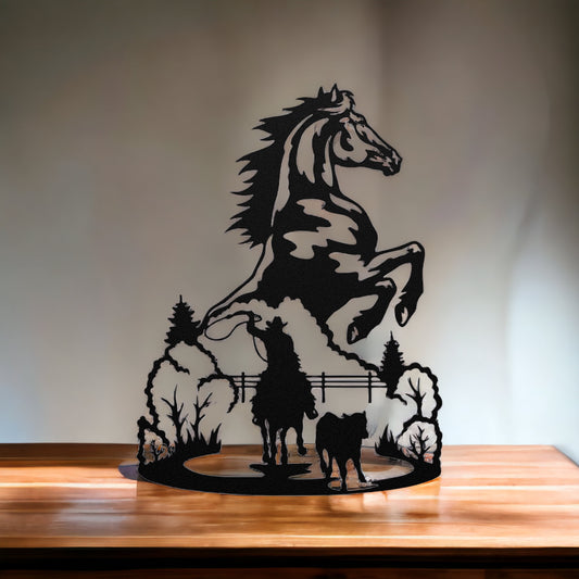 Horse metal art with cowboy scene
