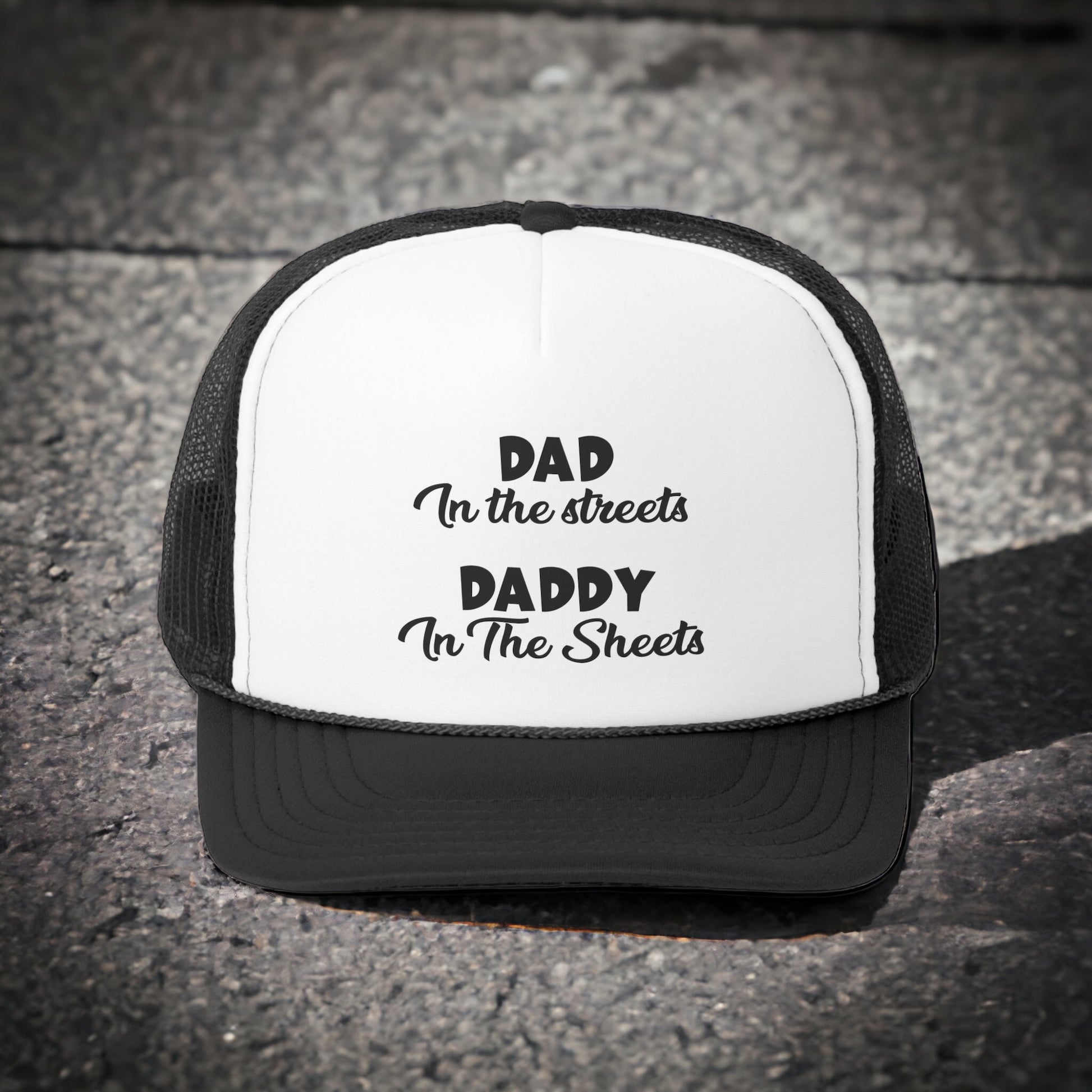 Funny dad trucker hat with cheeky "Dad in the Streets, Daddy in the Sheets" quote
