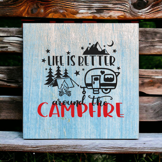 Camper wall decor with campfire scene
