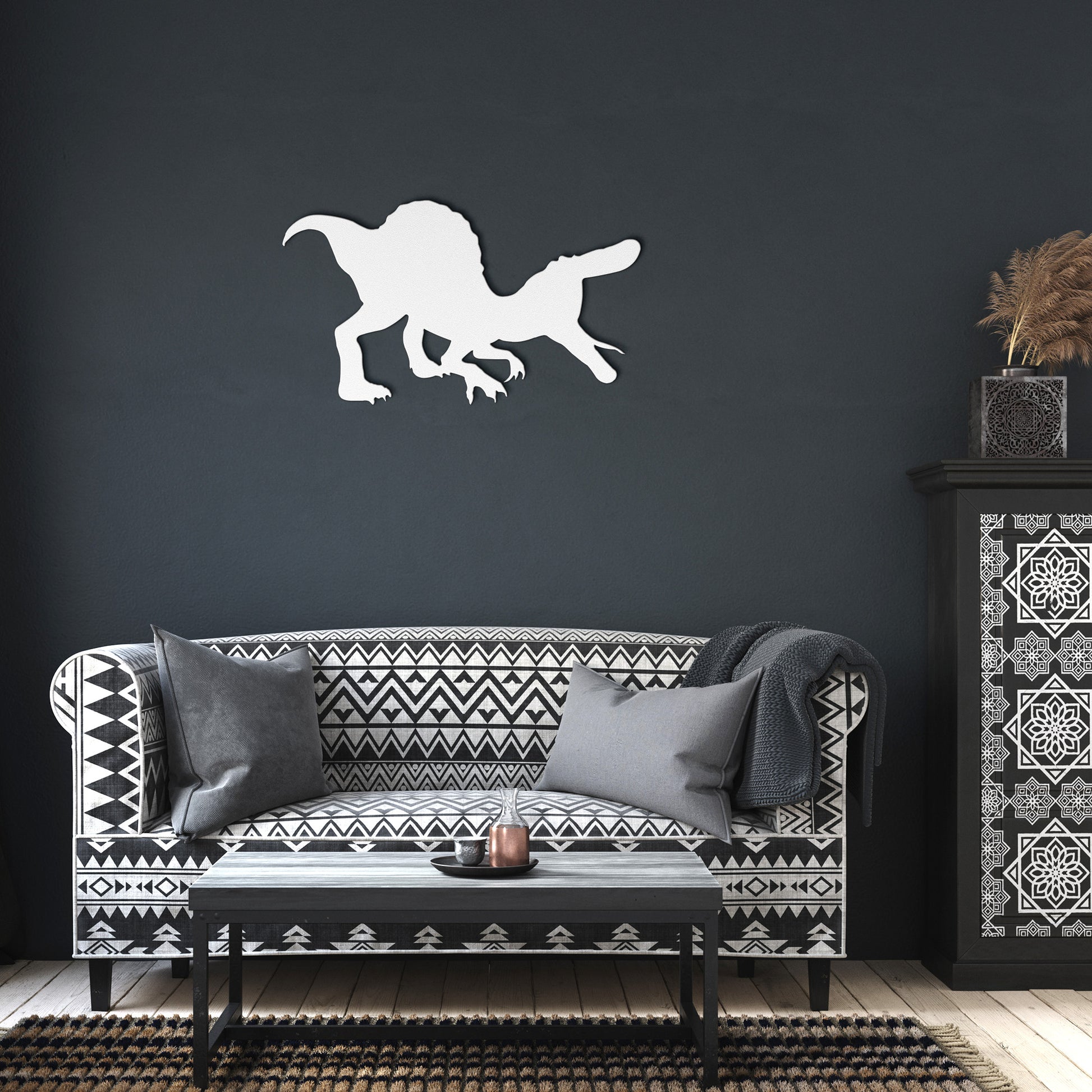 White metal dinosaur wall sign for quirky home decor.
