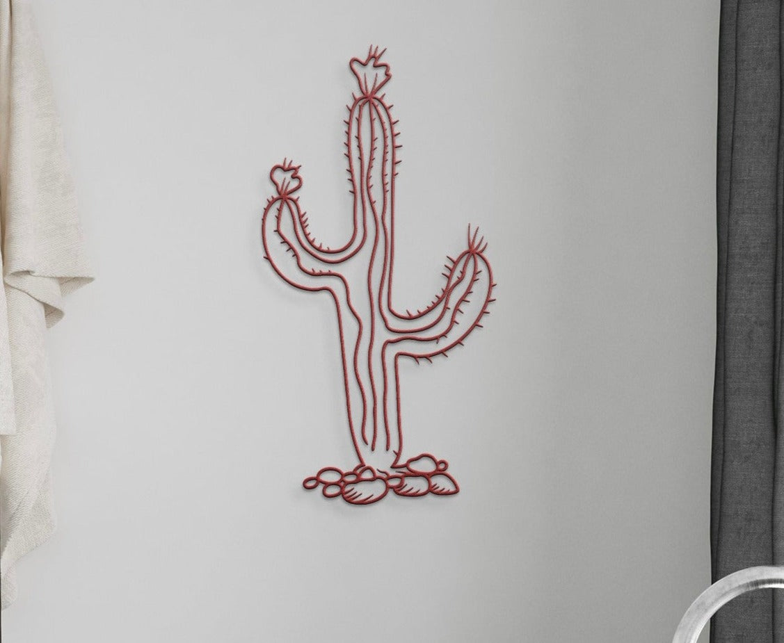 Close-up of desert steel cactus wall art in natural rust finish.