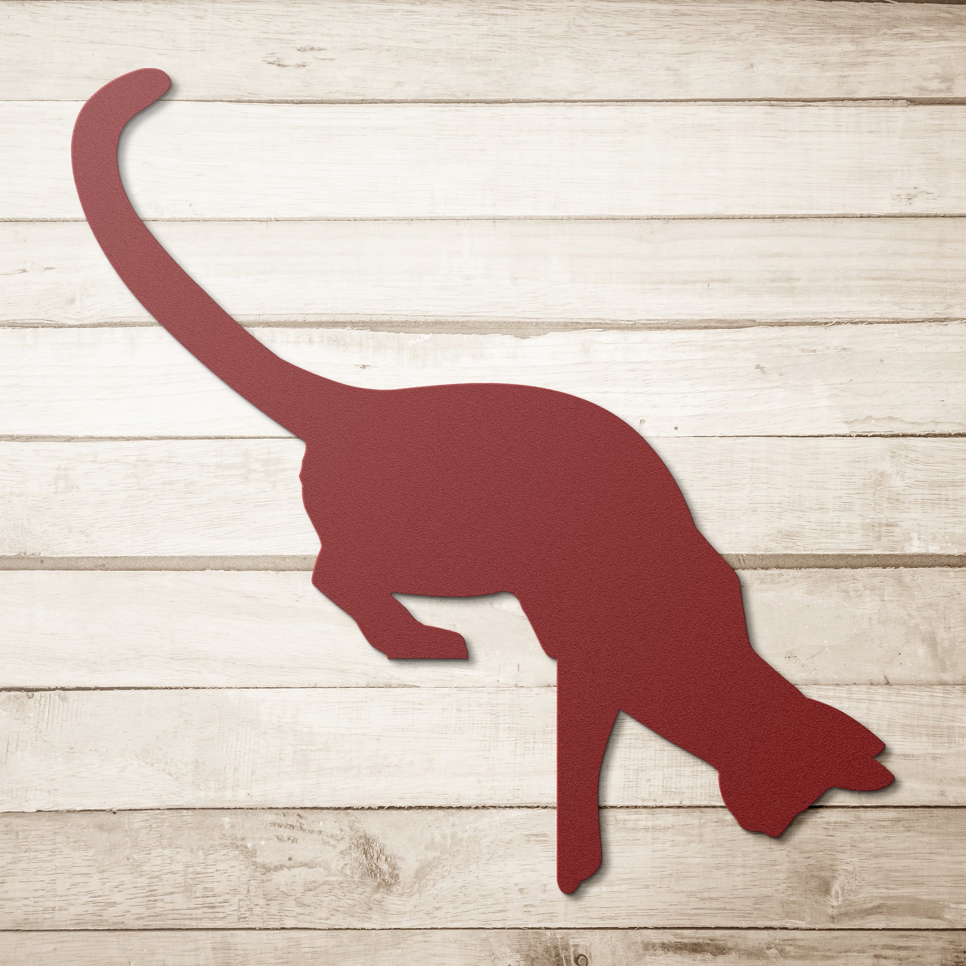 Cat metal art for home décor with playful design

