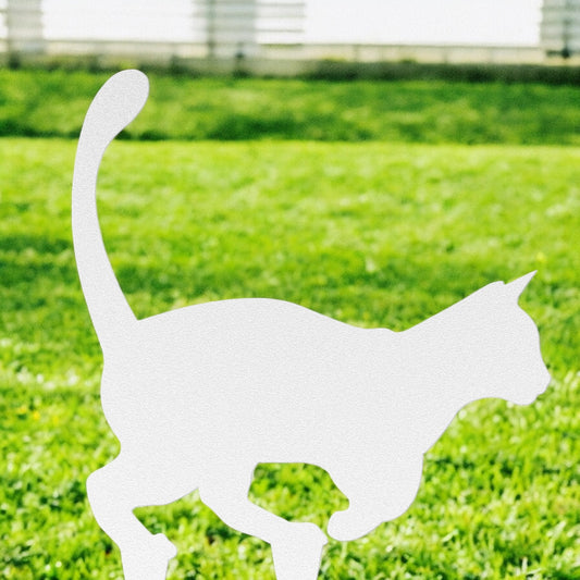 Outdoor metal cat sculpture in a pouncing pose for garden décor
