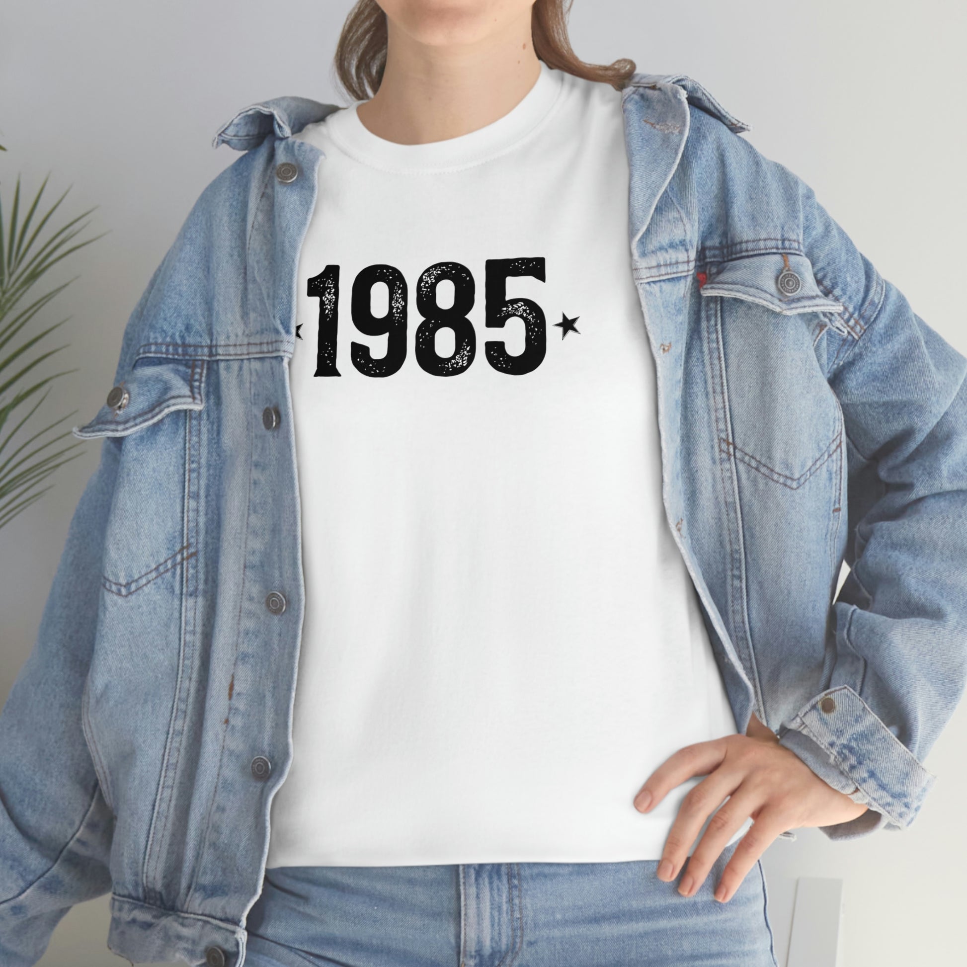 Commemorate the year 1985 with a cotton t-shirt featuring a tear-away label