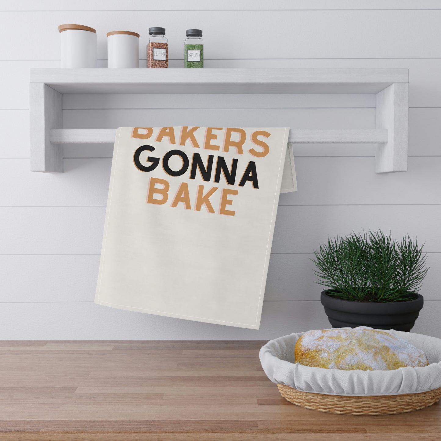 "Bakers Gonna Bake" cotton twill kitchen towel for baking enthusiasts.