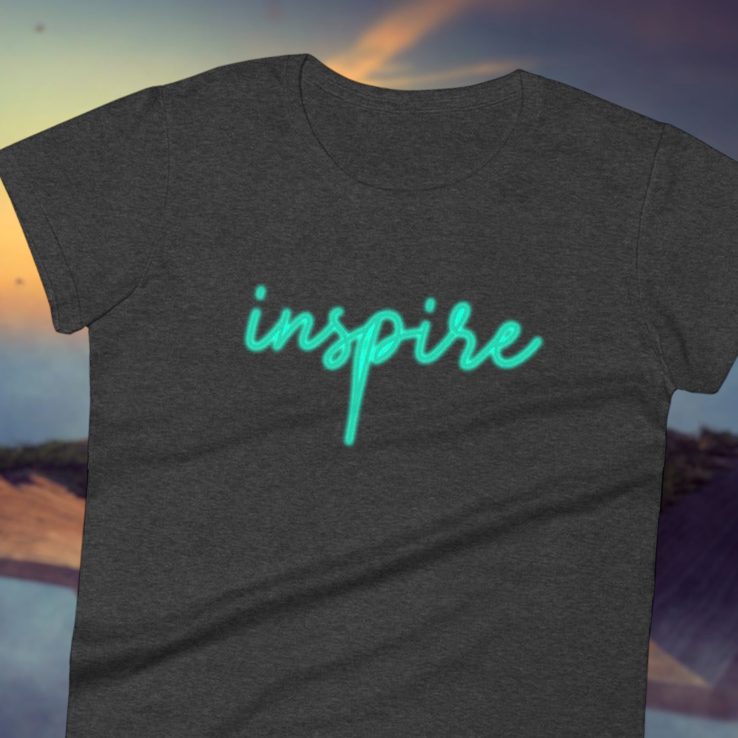 Women's Inspire shirt with neon glow style font
