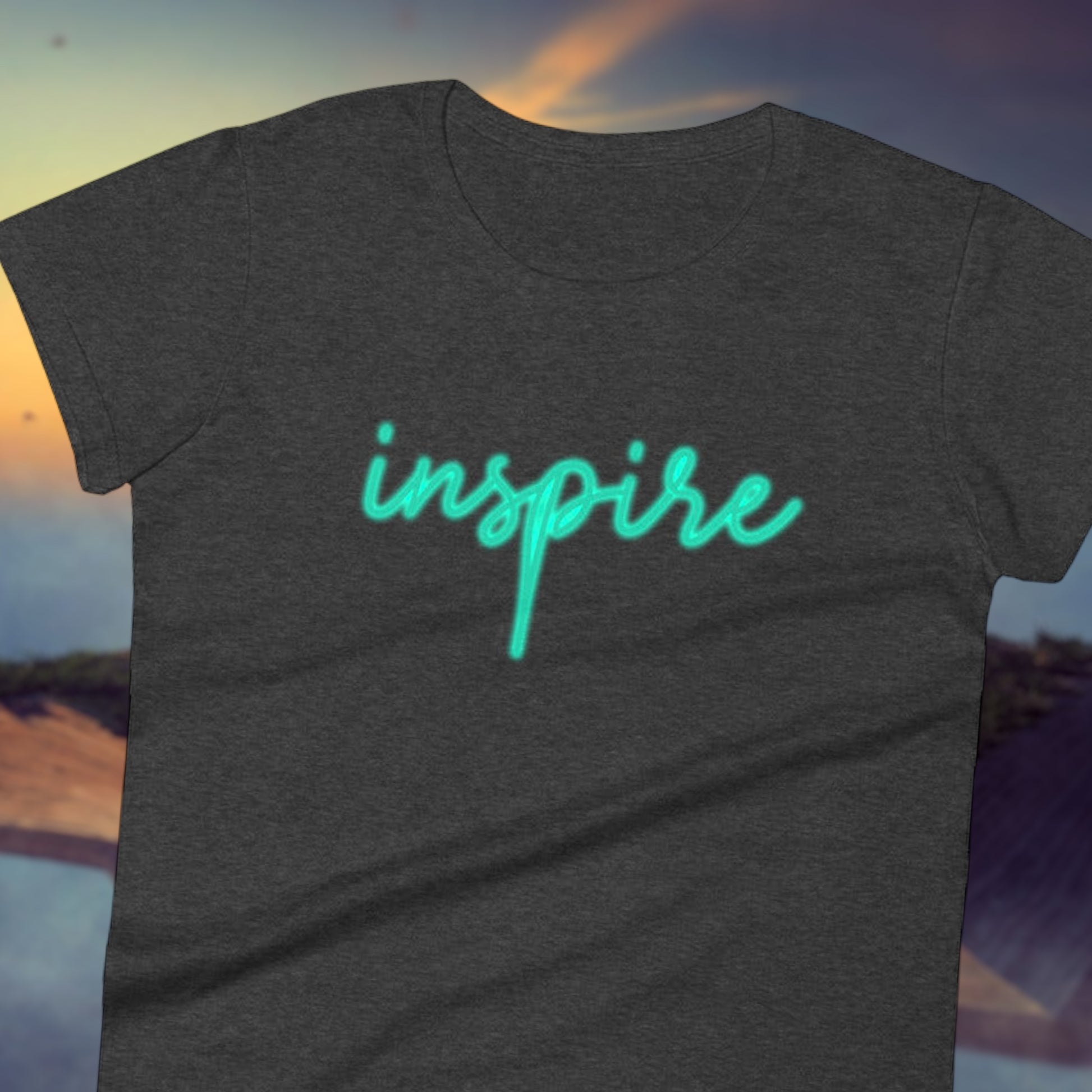 Women's Inspire shirt with neon glow style font
