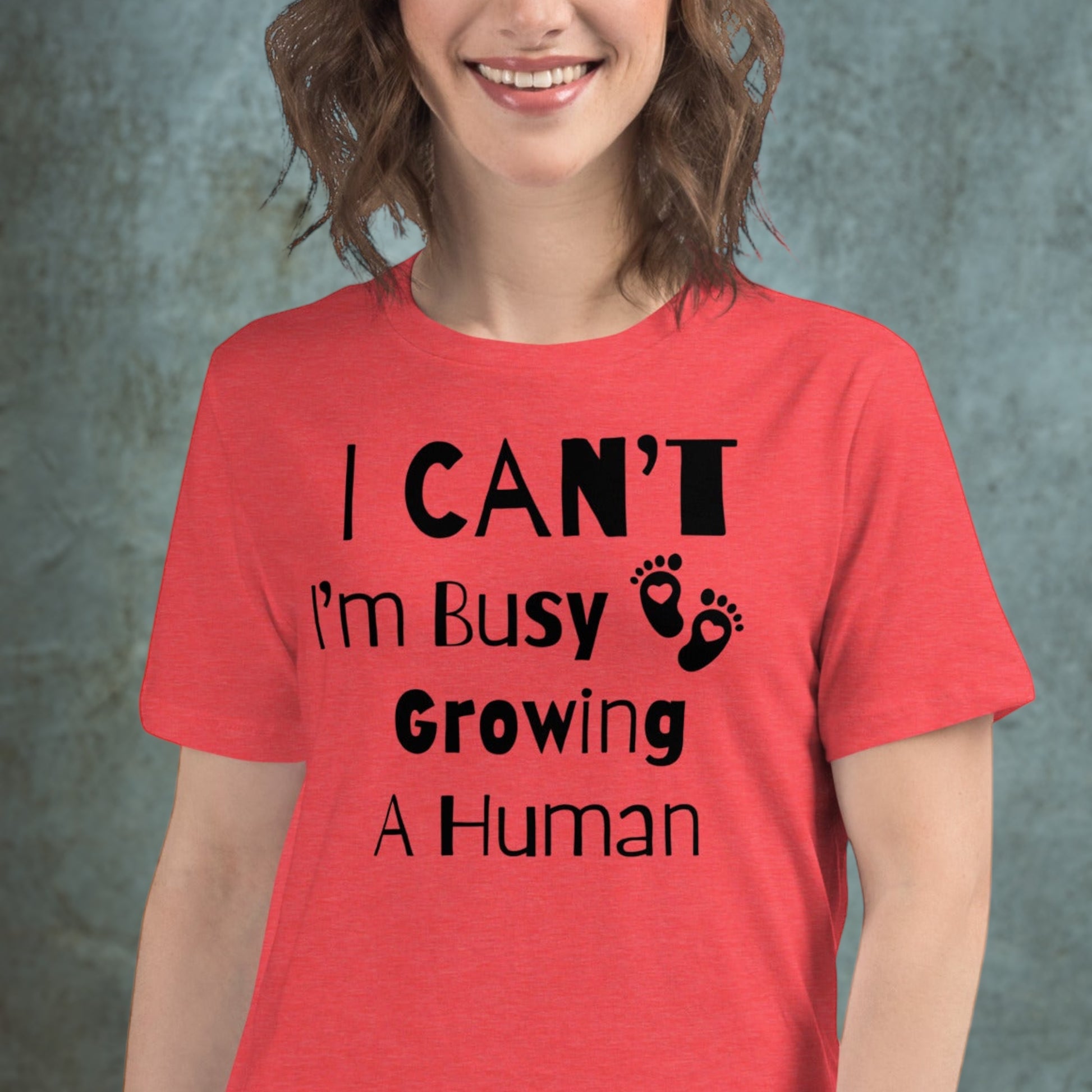 Pregnancy t-shirt with cute baby feet graphics
