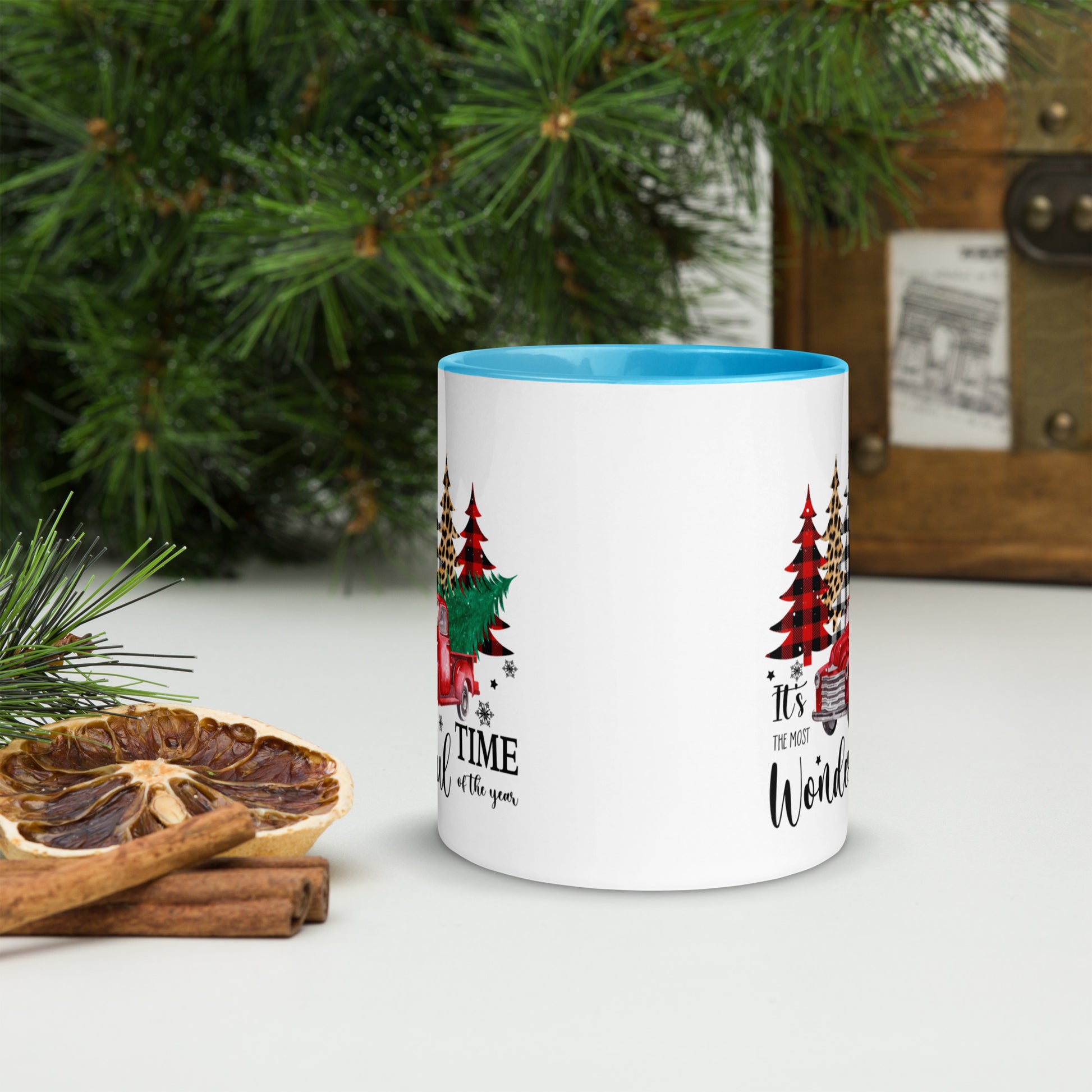 Holiday-themed mug with red truck and tree design

